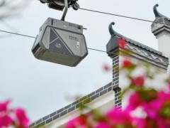 江西赣州现快递空中“穿梭机器人” 助农货出山