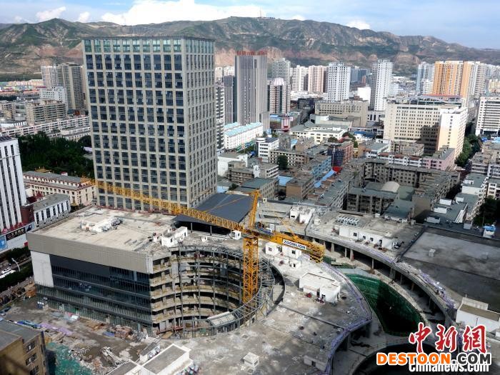 资料图：城中区某商品住宅楼。 孙睿 摄