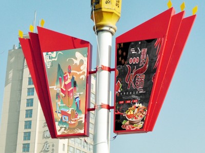 衡阳灯杆道旗灯箱是安装在路灯杆上像旗帜一样的广告灯箱又称灯杆广告牌画面可以发光