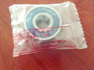 QD-250枕式包装机 鲜花饼自动包装机 五金配件轴承包装机